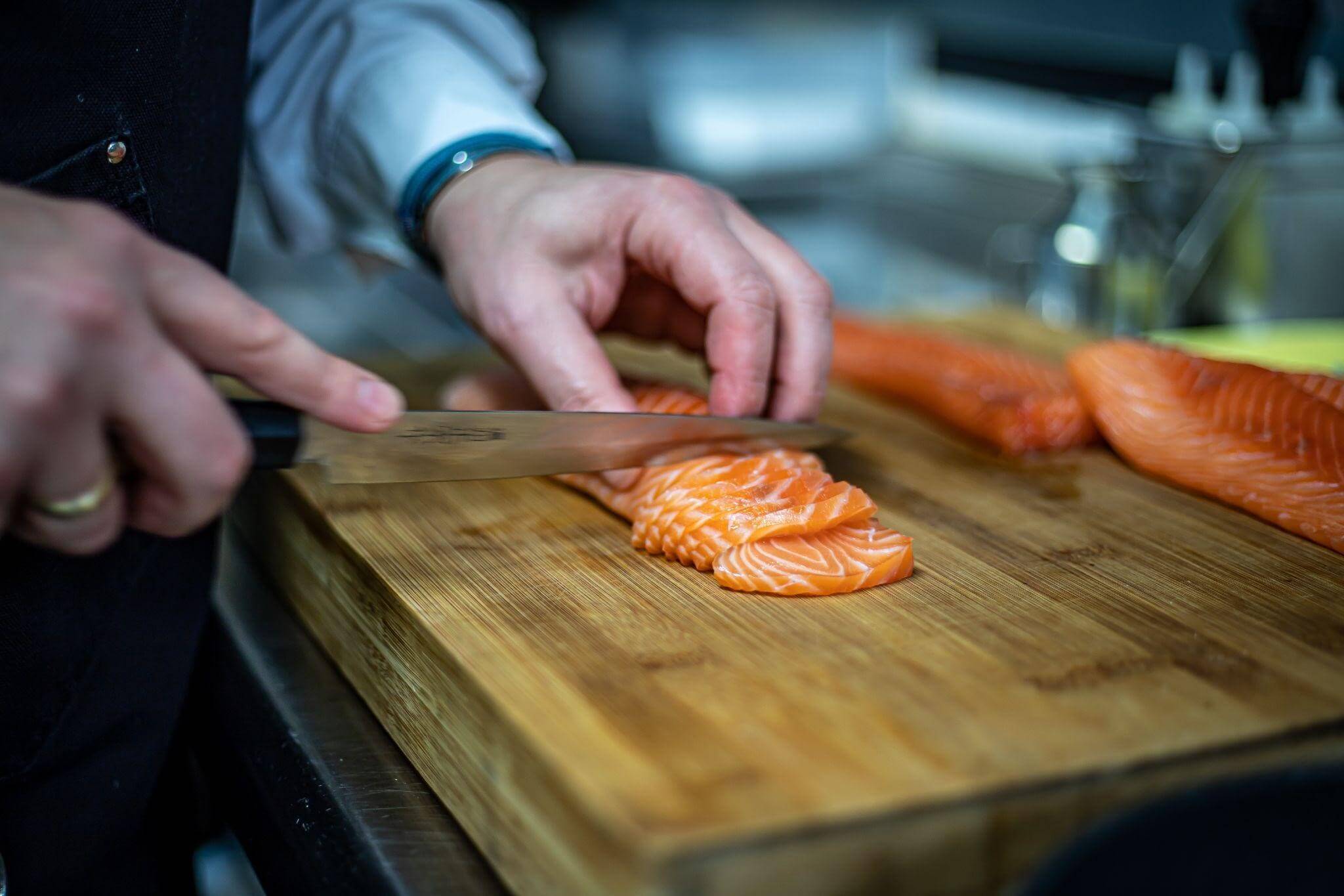 Thinly sliced salmon for sashimi