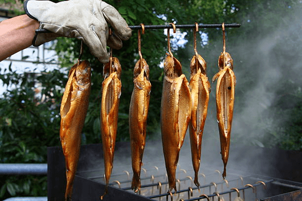 A set of smoked fishes almost ready to serve