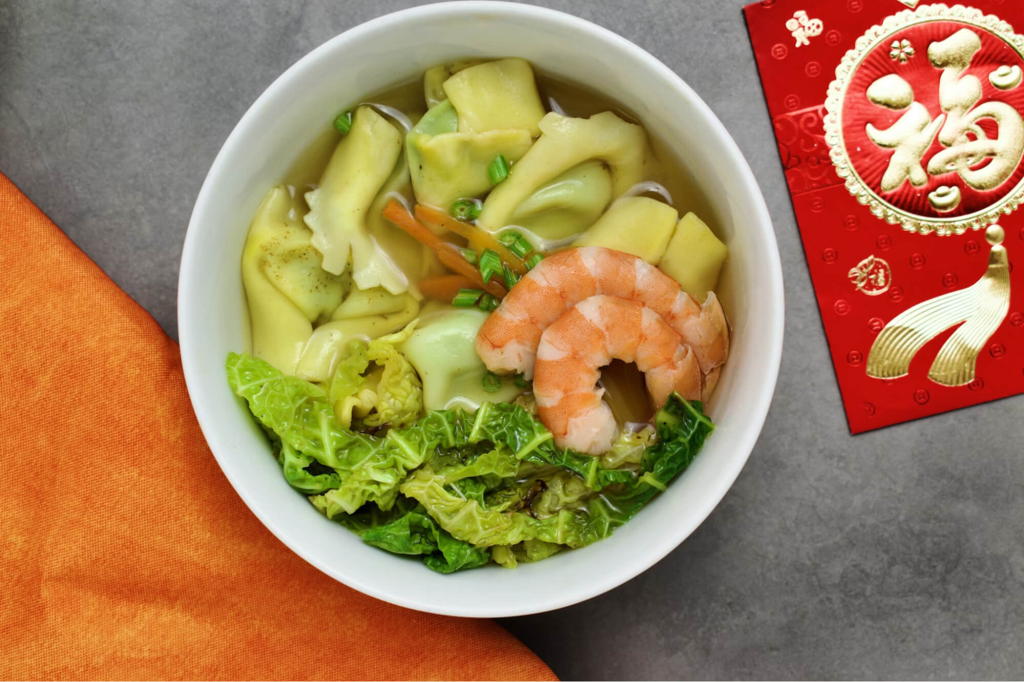 Wonton soup with shrimp and cabbage: a classic Chinese dish that is sure to please everyone.