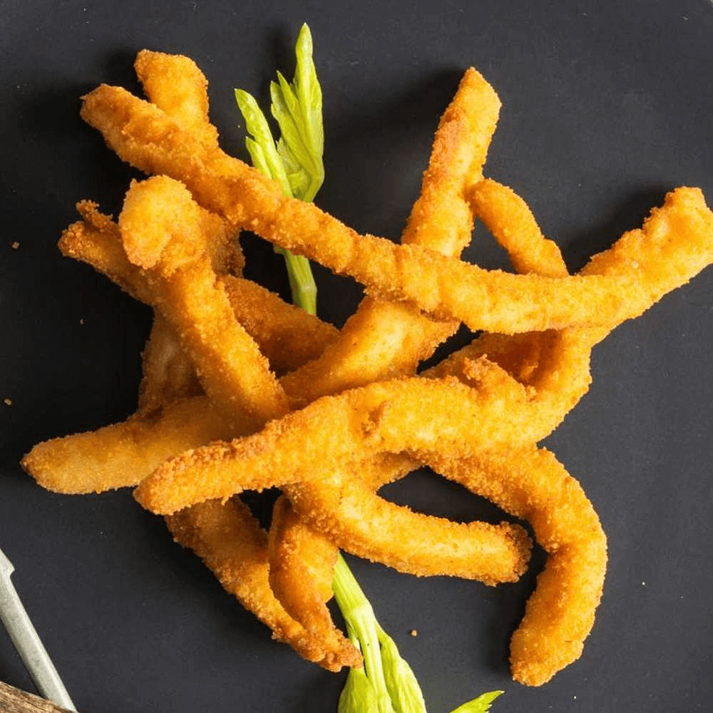 Battered and crumbed, these calamari strips are ready to be fried at home. Order them from Manettas!